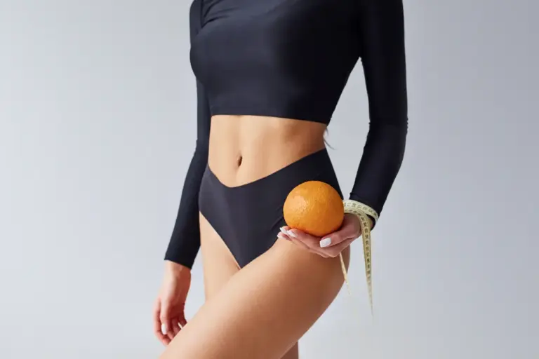 close up view of sportive woman with orange and me 2023 11 27 05 12 25 utc